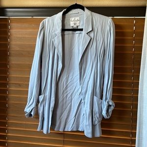 This a vintage blazer, very light weight from Aritzia. NWT